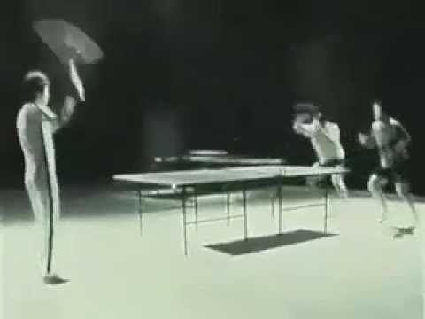 Bruce Lee playing ping pong